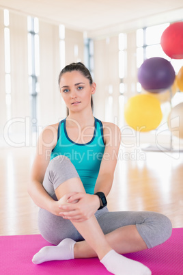 Woman taking a break in gym