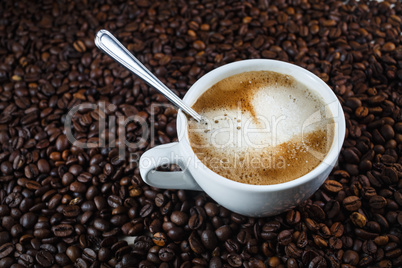 Coffee cup and coffee beans