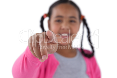 Girl pretending to touch an invisible screen