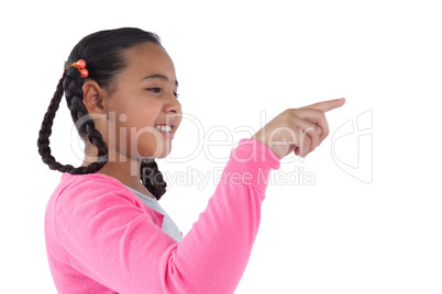Girl pretending to touch an invisible screen