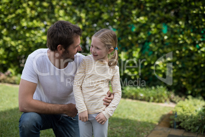 Father and daughter interacting