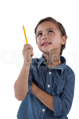 Boy standing against white background