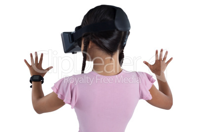 Girl using virtual reality headset against white background