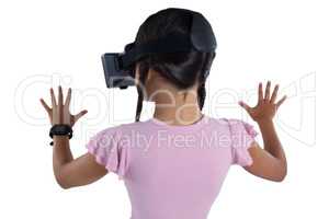 Girl using virtual reality headset against white background