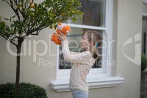 Young girl holding soft toy