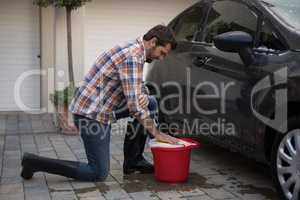 Man washing a car