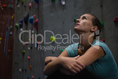 Close up of thoughtful athlete looking up in health club