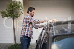 Man washing a car