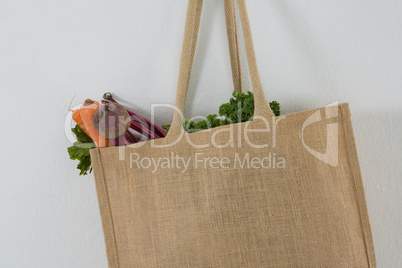 Fresh vegetables in grocery bag