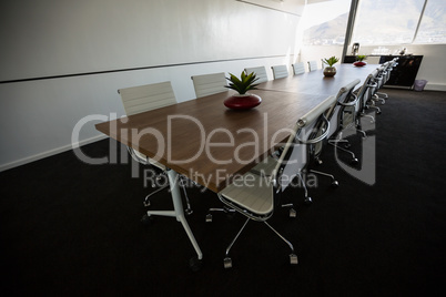 Conference table in empty meeting room