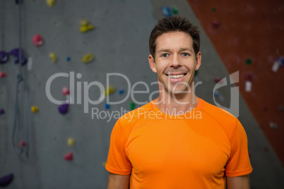 Close up portrait of smiling male athlete in club