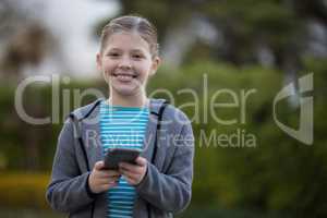 Young girl using mobile phone