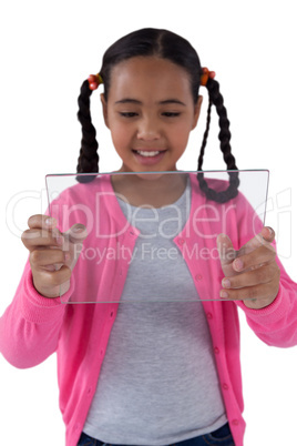 Girl using glass digital tablet Girl using glass digital tablet
