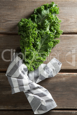 Kale vegetable with napkin on table