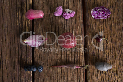 Various vegetable arranged on wooden table