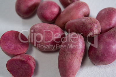Sweet potatoes on a white background