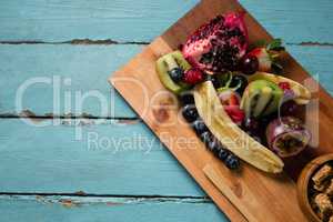 Slice of various fruits in tray