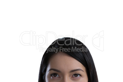 Thoughtful woman against white background