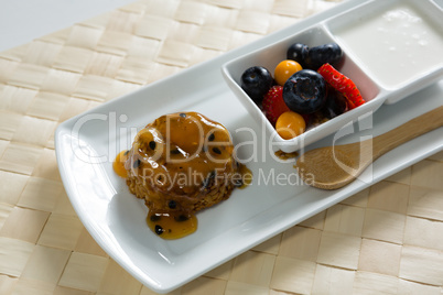 Healthy breakfast in serving plate on place mat