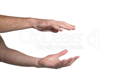 Hand pretending to hold an invisible object