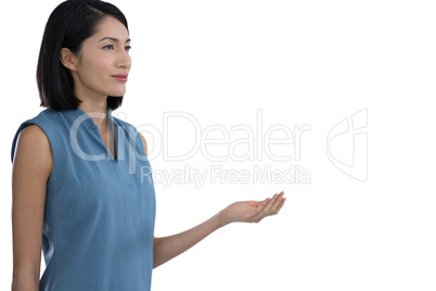 Female executive pretending to hold invisible object