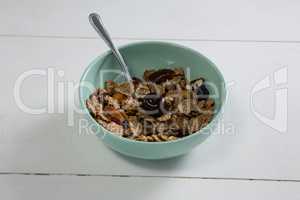 Bowl of wheat flakes with blueberry