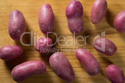 Sweet potatoes on cutting board