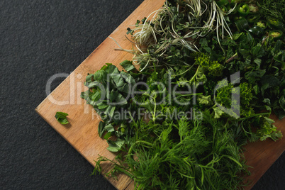Various herbs on a chopping board