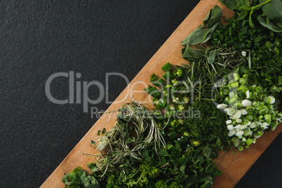 Various herbs on a chopping board