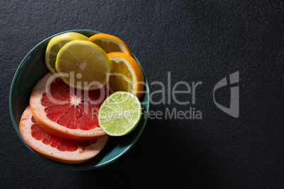 Various citrus slices in bowl