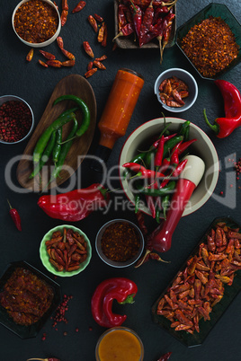Various spices arranged on black background