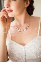 Midsection of beautiful bride wearing necklace