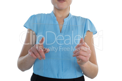 Mid section of businesswoman using transparent glass interface