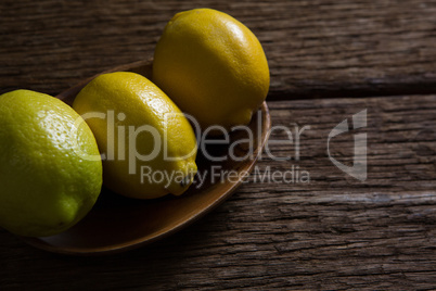 Close-up of fresh lemon in plate