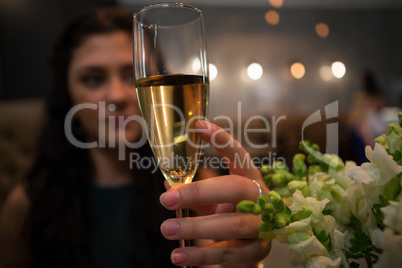 Beautiful woman holding champagne