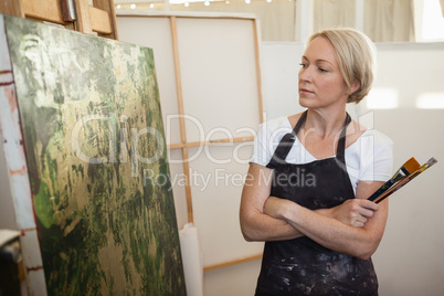 Woman standing with arms crossed