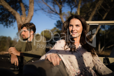 Young couple sitting in vehicle