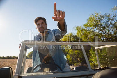 Man in vehicle looking away