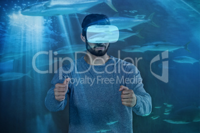 Composite image of man driving with vr