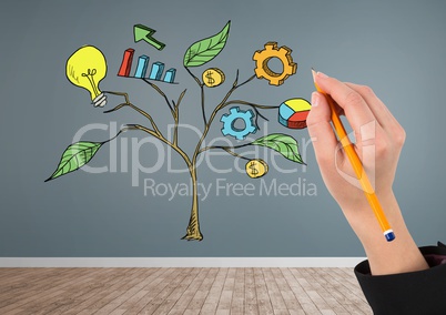 Hand holding pen and Drawing of Business graphics on plant branches on wall