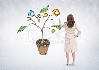 Woman holding pen and Drawing of Business graphics on plant branches on wall