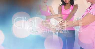 Breast cancer women holding hands with transition