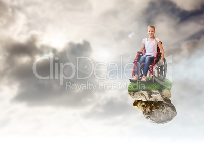 Young Girl on floating rock platform  in sky in wheelchair