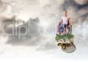 Young Girl on floating rock platform  in sky in wheelchair