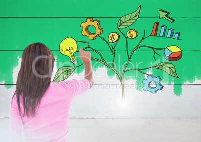 Woman holding pen and Drawing of Business graphics on plant branches on wall