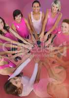 Breast cancer awareness women putting hands together