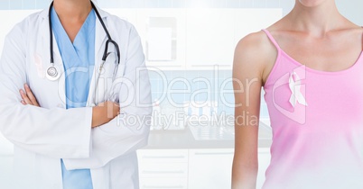 Breast cancer doctor and woman with pink awareness ribbon