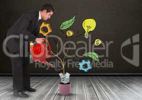 Man holding watering can and Drawing of Business graphics on plant branches on wall