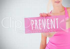 Prevent Text and Hand holding card with pink breast cancer awareness woman