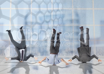 3 business people stuck upside down with transition background